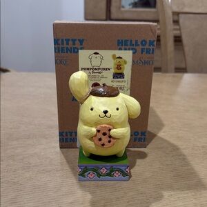 Sanrio by Jim Shore Pompompurin Figurine with Cookie